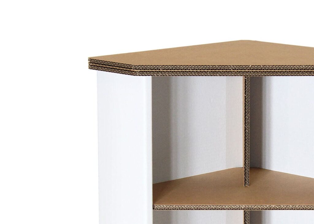Comptoir en carton TENAGA pour stands événementiels avec plateau épais et structure renforcée en panneaux cartonnés, idéal pour scénographie professionnelle et décoration de salons - Le Meuble en Carton une marque du groupe Natur Design