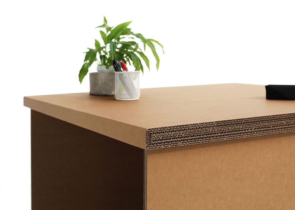 Extension banc d'accueil PMR en carton écologique, conçue pour les espaces professionnels et l'accueil en entreprise avec plateau solide en cartonnage renforcé, intégrant des finitions élégantes et adaptée à l'accessibilité universelle - Le Meuble en Carton une marque du groupe Natur Design